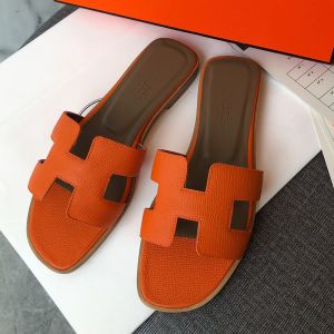 Hermes Oran Slides Women Grain Calfskin In Orange